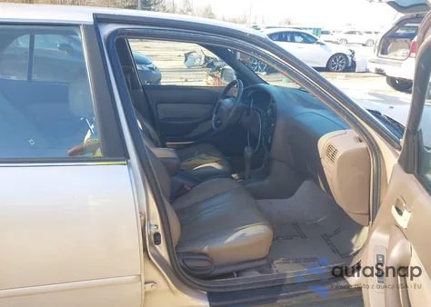 1995 Toyota Camry Dx z USA, uszkodzony, nr VIN 4T1SK11E5SU583322